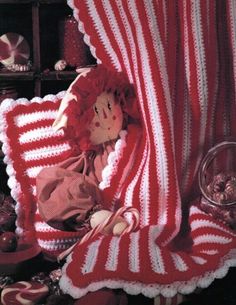 "Vintage Christmas Crochet Pattern Peppermint Candy Afghan and Pillow Save 20% when you buy 5 or more patterns of your choice. Enter SAVE20 at checkout Pattern is called: Candy Stripes Vintage Pattern dates 1980's Afghan Finished Size: 42\" x 58\" Pillow Finished Size :Approx. 12 in diameter  Materials: See photos for materials list Skill Level:  Intermediate This PDF pattern will be available for instant download from Etsy upon confirmation of your payment. File contains full color picture with Christmas Afghan, Christmas Crochet Blanket, Christmas Crochet Pattern, Peppermint Candy Cane, Vintage Crochet Pattern, Crochet Vintage, Candy Cane Stripes, Crochet Afghans, Sport Weight Yarn