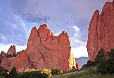 the mountains are very tall and red in color