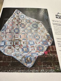 an old quilt is displayed on the back of a magazine page with information about it