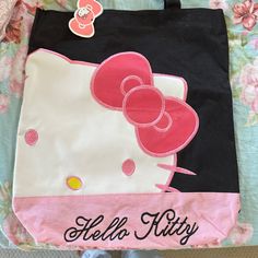 Never Used Pink Rectangular Bag With Cat Design, Casual Pink Shoulder Bag With Cat Design, Pink Rectangular Shoulder Bag With Cat Design, Pink Cat Design Shoulder Bag For Everyday, Pink Hello Kitty Rectangular Bag, Hello Kitty Pink Shoulder Bag For Travel, Pink Hello Kitty Shoulder Bag For Travel, Trendy Black Bag With Hello Kitty Print, Pink Hello Kitty Rectangular Shoulder Bag