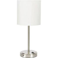 a lamp that is sitting on top of a table with a white lampshade