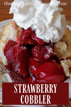 strawberry cobbler on a plate with whipped cream and strawberries in the center, along with text overlay