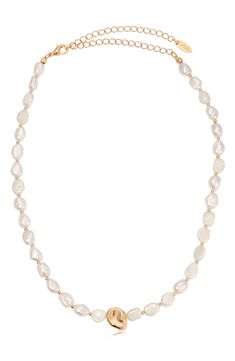 Lustrous freshwater pearls illuminate an elegant collar necklace centered by a molten bead plated in glossy 18-karat gold. 15" length; 5" extender 7mm pearls Lobster clasp closure Pearl size: 8.5–9mm Freshwater pearl/18k-gold plate Imported Freshwater Pearl Necklaces, Pearl Size, Collar Necklace, Fresh Water, Freshwater Pearls, Pearl Necklace, 18k Gold, Gold Plate, Nordstrom