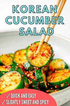 korean cucumber salad in a white bowl with chopsticks sticking out of it