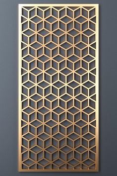 a gold metal panel with geometric design on it's sides and an openwork pattern in the middle