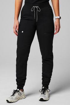 On-Call Scrub Jogger Fabletics black female Activewear >> Scrubs >> Bottoms >> Product Feed MotionTech regular Shoes To Wear With Black Scrubs, Figs Black Scrubs, Scrub Sets For Women, Cute Scrubs Aesthetic, Black Scrubs Outfit Cute, How To Make Scrubs Look Cute, Scrub Outfits Cute, Scrubs Uniform Cute Black Women, Figs Scrubs Aesthetic