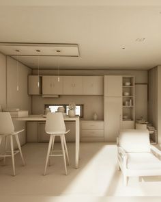 a white kitchen and living room are shown in this image