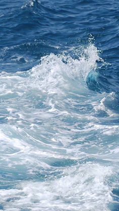 a person riding a surf board in the ocean