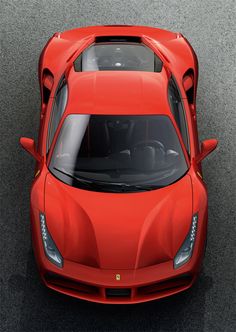 an overhead view of a red sports car