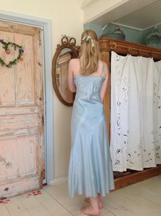 this slip dress has a beautiful color and would be amazing underneath a tulle lace dress or skirt...or another transparent garment like a tulle camisole, or blouse. or just wear it as a night gown bust  94 cm  37" (high ) waist  84 cm  33"   (model has waist  78 cm ) length from top of the shoulder to the bottom:  152 cm  60" I saw a bit discoloration in strong condition Spring Sheer Silk Slip Dress, Sheer Silk Slip Dress For Night, Sheer Night Slip Dress For Spring, Sheer Slip Dress For Spring Night, Spring Night Sheer Slip Dress, Sheer Satin Dress For Daywear, Blue Silk Slip Dress For Night, Sheer Fitted Slip Dress For Wedding Night, Blue Satin Slip Dress For Night