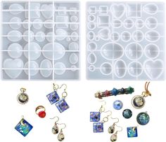 two plastic trays filled with different types of jewelry and earrings on top of each other