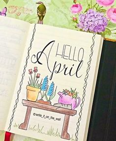 an open notebook with the words hello spring on it