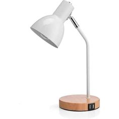 a white desk lamp sitting on top of a wooden base