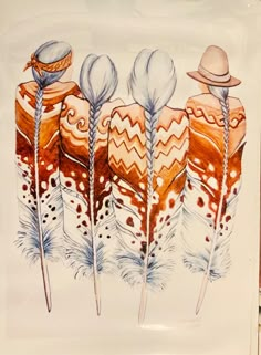 an image of three feathers with hats on them