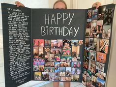 a woman holding up a happy birthday sign with photos on the front and back of it