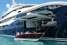 people are on the deck of a large boat