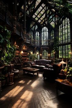 a living room filled with furniture and lots of windows covered in plants on top of them