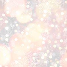 blurry image of snowflakes and christmas balls in pink, yellow and white