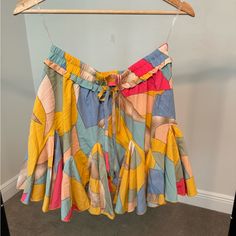 Colors: Yellow, Pink, Blue, Teal Size M Nwt Length: 14.5” Multicolor Cotton Skirt For Day Out, Chic Yellow Bottoms With Ruffles, Summer Multicolor Ruffled Mini Skirt, Chic Multicolor Cotton Skirt, Chic Yellow Ruffled Bottoms, Yellow Ruffled Cotton Bottoms, Yellow Cotton Bottoms With Ruffles, Yellow Cotton Ruffled Bottoms, Summer Multicolor Mini Skirt For Day Out