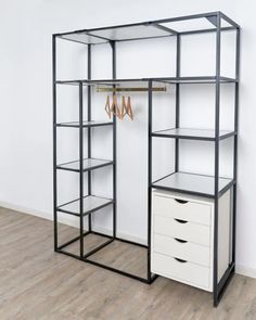 an open closet with shelves and drawers