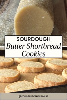 a batch of shortbread cookies sitting on top of a baking pan with the words sourdough butter shortbread cookies