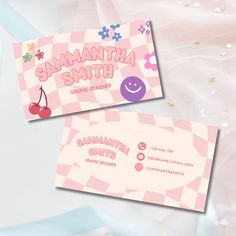 two business cards with the words savannah smith on them and an image of a cherry