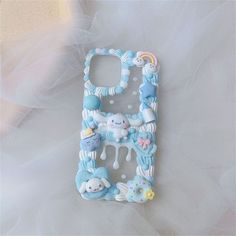 a cell phone case that is made to look like it has some animals on it