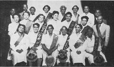 an old black and white photo of a group of people