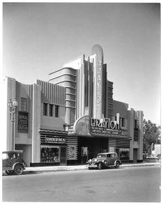 an old black and white photo of a movie theater