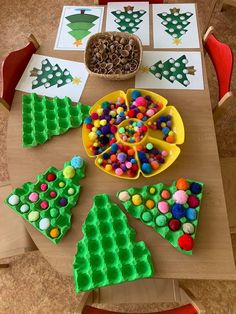 a table topped with lots of different types of cakes and candies on top of it