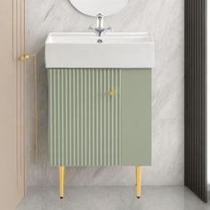 a white sink sitting under a mirror next to a wall mounted faucet in a bathroom