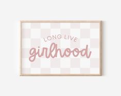 a pink and white poster with the words long live girlhood in cursive font