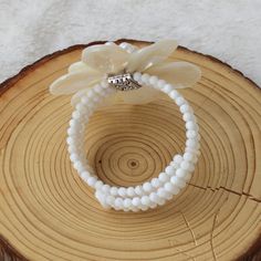 "Applications: wedding, engagement, daily wear,party Material: Pearl, shell,shell beads beads size :4-6-8mm,15*15mm ,20*30mm Bracelet Size:6.5-7.5\" Color: As show We can adjust the length of your requirements All the product are designed and made by myself so if you want any adjustments in length or style, don't forget to contact me. Otherwise, I will send you the one in the picture. Welcome wholesale and customization. We can customize according to your requirements. Payment We accept PayPal o White Shell Jewelry Gift, White Shell-shaped Bracelet As A Gift, White Shell-shaped Bracelet For Gift, Elegant Adjustable Shell Bracelet, White Handmade Shell For Wedding, White Shell Bracelets As A Gift, White Shell Bracelets Perfect For Gifts, Elegant Shell-shaped Bracelets, Adjustable Mother Of Pearl Shell Gift