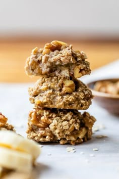 chocolate chip cookies stacked on top of each other with oats in the middle and raisins all over them