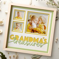 a photo frame with the words grandma's greetings written in green and yellow