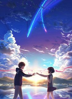 two people holding hands in front of the sky