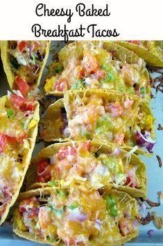 cheesy baked breakfast tacos on a plate with text overlay that reads cheesy baked breakfast tacos