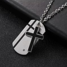 Personalize Stainless Steel Cross Dog Tag Necklace Pendant with ChainPersonalization: Free engraving 4 lines up to 20  characters per lineProduct Info:Material: Stainless Steel Size: 45mm x 22mmChain size: 24" + 2" extensionFree Engraving316L is the highest grade of stainless steel used in the jewelry market. It is so good at resisting fade, rust, and corrosion, that it is used in architecture as well as in marine environments. At the same time, it is safe to use for medical purposes inside the Engraved Promise Rings, Jewelry Market, Silver Claddagh Ring, Forever Gifts, Steel Cross, Jewellery Marketing, Pendant With Chain, Mens Pendant, Cross Jewelry