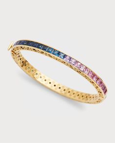 Dolceamp;Gabbana bangle    18karat yellow gold    One DG, VVSVS diamond    45 square shape multicolor sapphires    Red, orange, pink, yellow, green, blue and purple sapphires    Diamond total carat weight: 0.005    Pushlock closure    Made in Italy Pretty Jewelry Necklaces, Multi Sapphire, Purple Sapphire, Vs Diamond, Sapphire Bracelet, Fabulous Jewelry, Pretty Jewelry, Colorful Bracelets, Pretty Jewellery