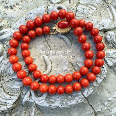 Simple and elegant Sardinia coral bead necklace with an 18k yellow gold clasp! Total Weight: 45.86 grams Necklace Length: 17 inch 18k gold clasp: 18.8mm x 13.7mm Precious Metal: 18k gold Precious stones: -Coral Round Beads: 8.1mm to 9mm diameter -Coral Faceted Oval: 12..3mm x 8.5mm Formal Coral Single Strand Beaded Necklace, Elegant Red Coral Necklaces With Polished Beads, Elegant Hand-strung Coral Necklaces, Elegant Coral Hand-strung Necklaces, Elegant Hand-strung Coral Necklace, Elegant Orange Hand-strung Necklace, Red Coral Oval Bead Jewelry As Gift, Oval Beads Red Coral Jewelry Gift, Elegant Single Strand Red Coral Necklaces