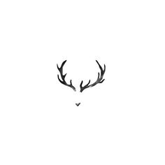 a deer's head with antlers drawn on it