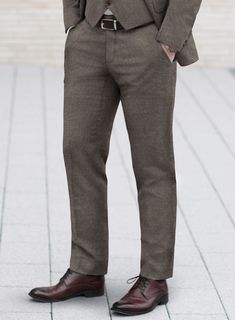 Experience a commanding aesthetic with our Lanificio Zegna Trofeo Intense Brown Wool Pants. Tailored with luxurious Australian wool fabric, our pants deliver a regal look and feel with their sleek finish that exudes style, while its subtle brown shade commands attention at any formal event. So enjoy a touch of royal elegance with this remarkable garment and make a solid impression at elite celebrations.  Look Includes    Lanificio     Zegna     Trofeo Intense Brown   Wool  Fabric  Cross Pocket Brown Wool Suit, Brown Wool Pants, Plaid Tuxedo, Pants Tailored, Fabric Cross, White Linen Pants, Brown Shade, Herringbone Tweed, Fun Pants