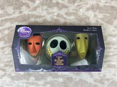 three halloween masks are in the package