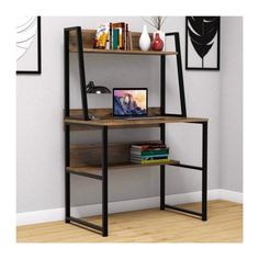 a computer desk sitting on top of a wooden shelf next to a book case and vase