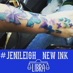 a person with tattoos on their arm and the words, jerleigh new ink