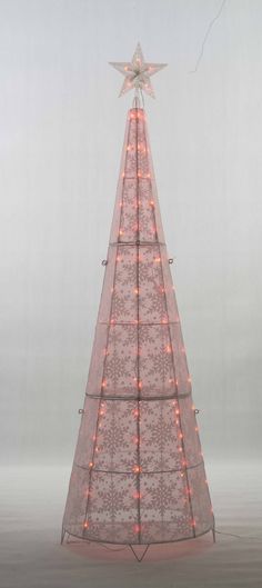 Light up your Hoilday with this 72" Color changing LED Glittering Snowflake Cone tree sculpture. INDOOR/OUTDOOR USE, This sculpture is made with K/D constuction, and coated metal with glittering snowflake.60" Lead wire, with 115 PCS color change LED bulbs. Metal Stakes included. EverStar 72-in Tree Yard Decoration with Clear LED Lights | ES-67004 Cone Trees, Tree Sculpture, Color Changing Led, Tree Ideas, Outdoor Christmas Decorations, Outdoor Christmas, Yard Decor, Led Bulb, Color Change