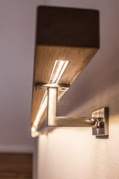 a close up of a light on the wall