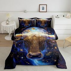 a bed with a cow head on it and stars in the night sky behind it