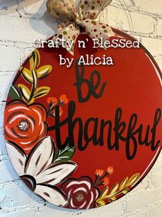 a painted sign that says, crafty'n blessed by alicia be grateful