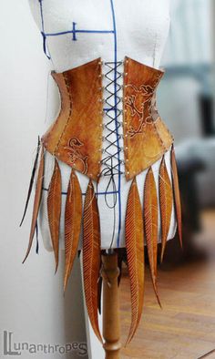 Interesting idea with the leather feather trim.Don't think I'm up to doing this but it is very cool looking. Wood Nymph, Leather Feathers, Black Fish, Net Stockings, Mode Hippie, Leather Armor, Fish Net, Leather Corset